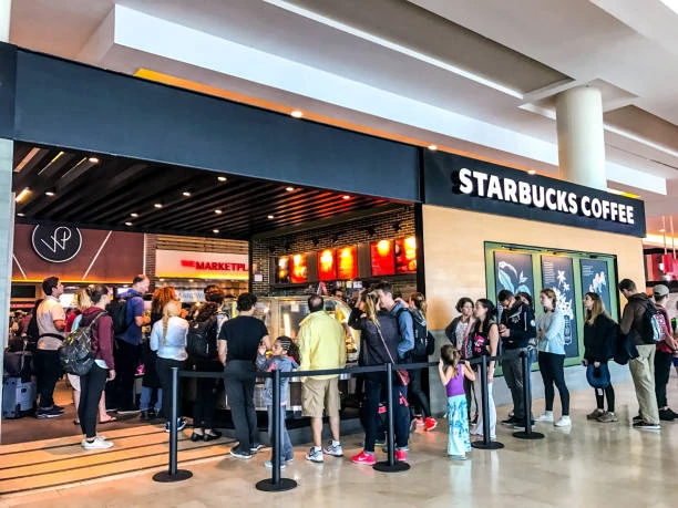 People waiting in line due to slow registers and bad WIFI signal