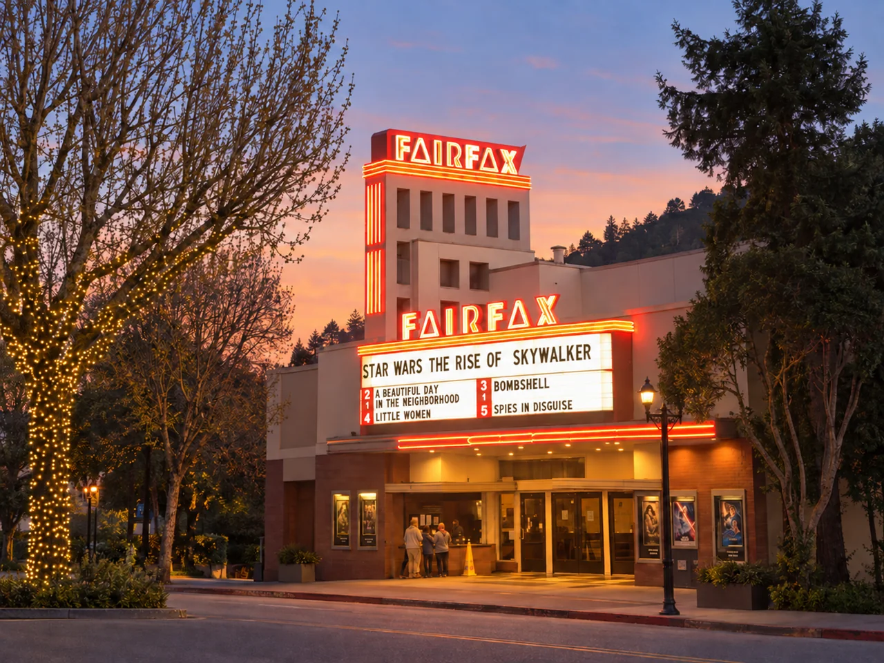 Fairfax Theatre neon marquee at dusk in downtown Fairfax, California